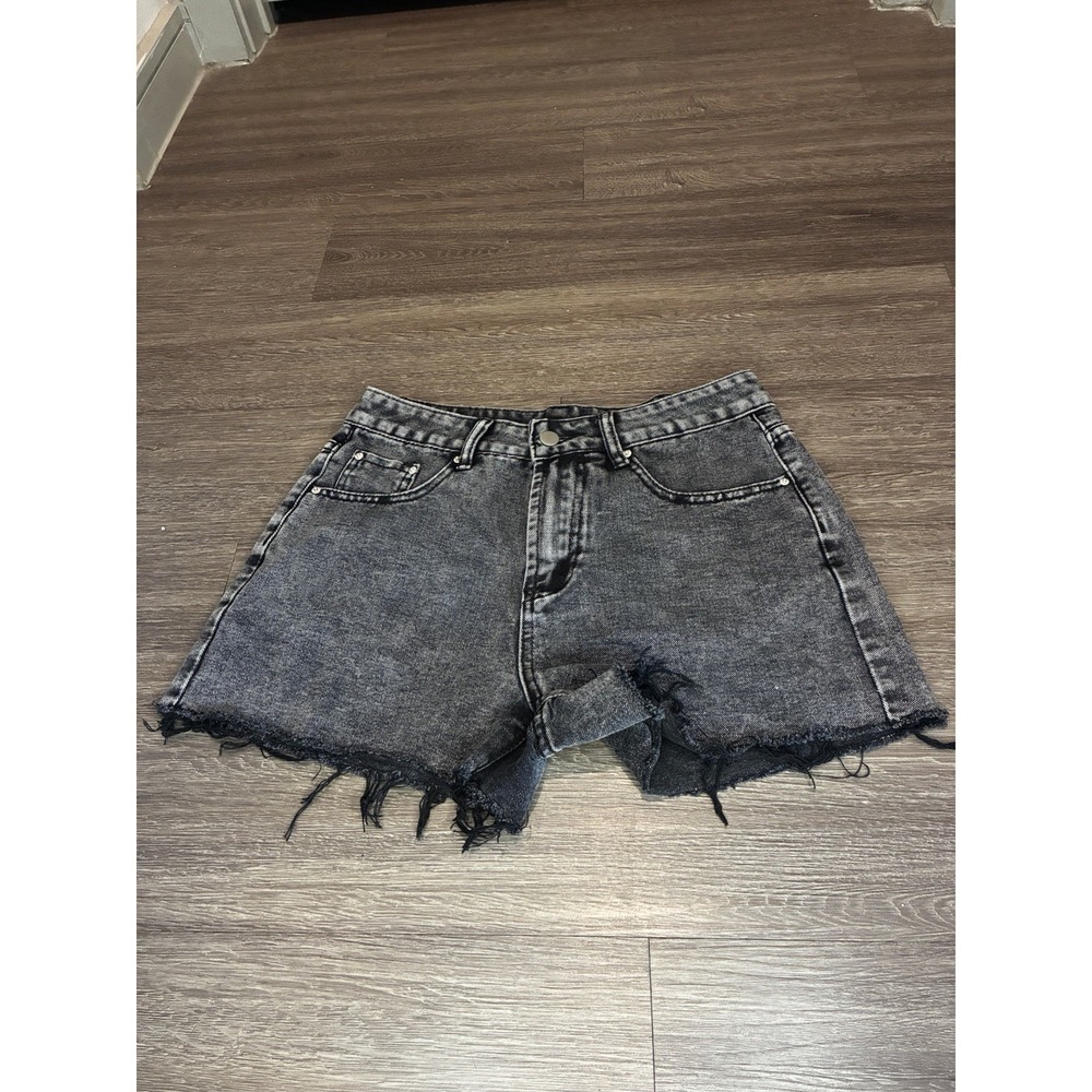 high-rise black acid wash denim shorts featuring a frayed raw edge hem